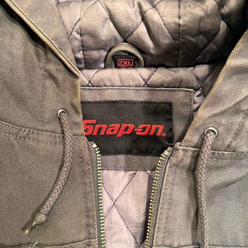 Snap-on bomber jacket, extremely thick and warm.